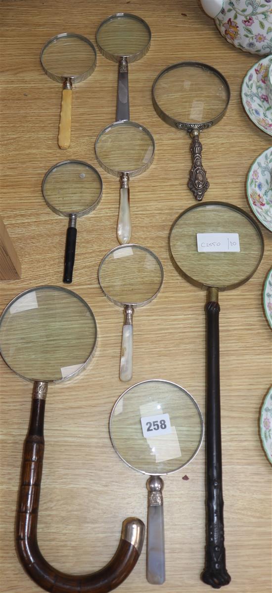 Nine magnifying glasses